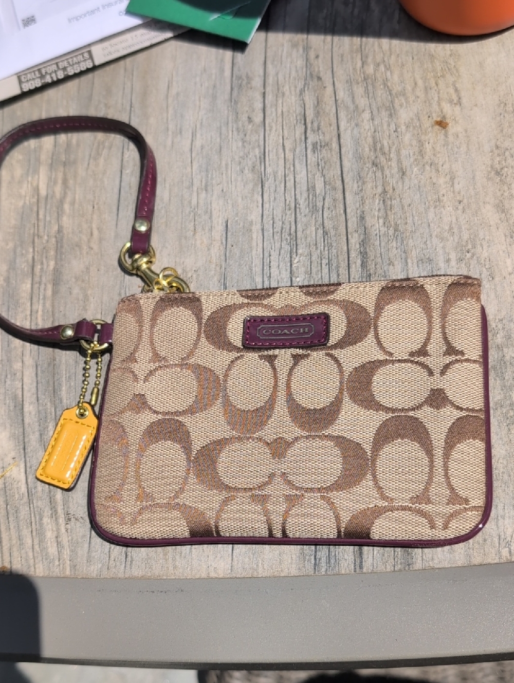 Coach Beige Signature Canvas Wristlet with Plum Trim